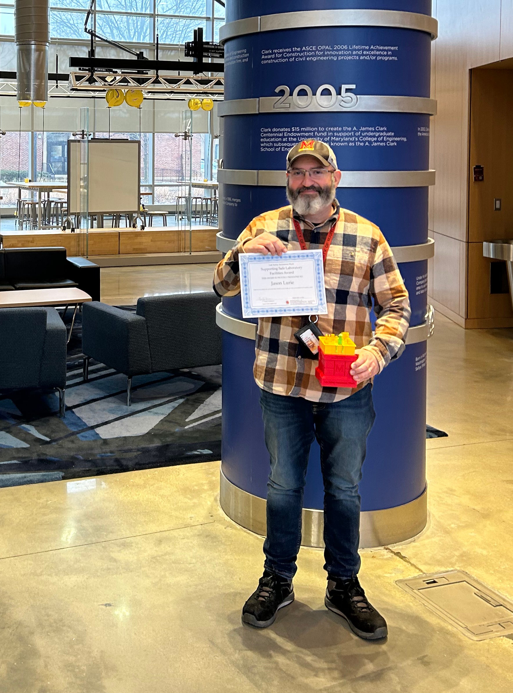 Jason Lurie, FM Liaison for Animal Research and New Facility Construction, receives the Supporting Safe Laboratory Facilities Award during Lab Safety Awareness Week.