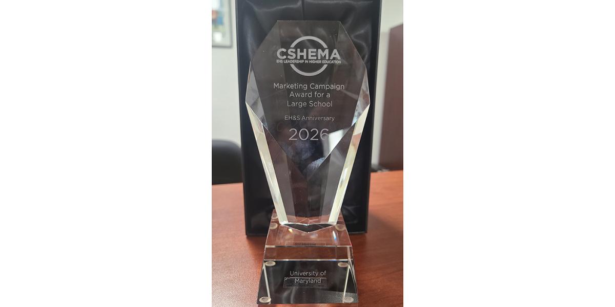 Glass plaque recognizing the University of Maryland with the 2026 CSHEMA Marketing Award